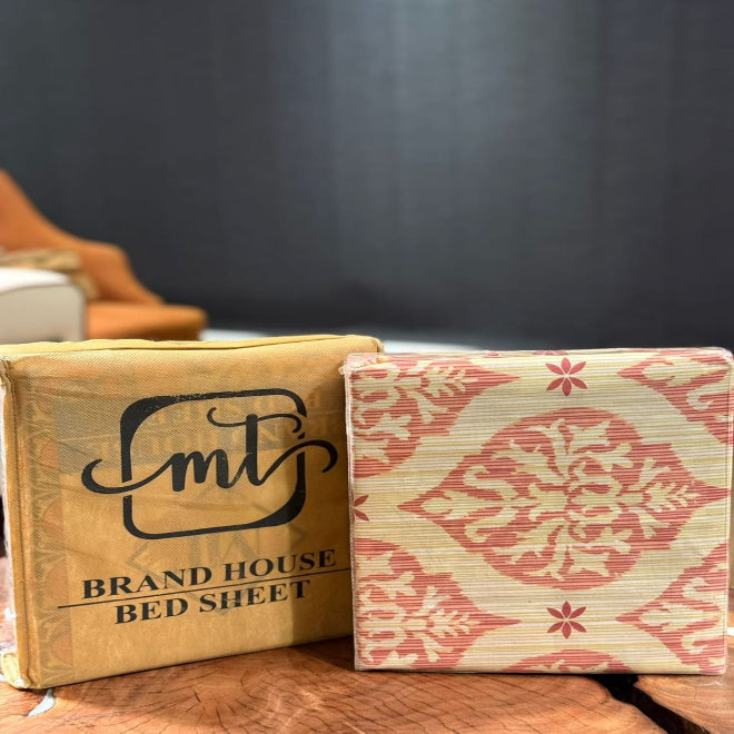 Packaged bed sheet with brand logo on a wooden surface